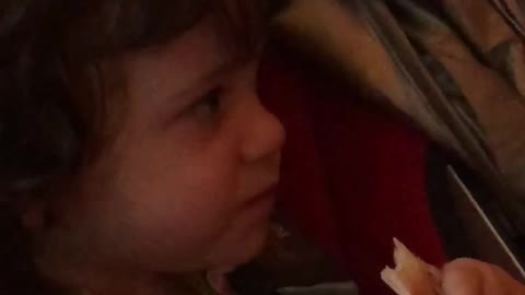 Mila eating quesadilla