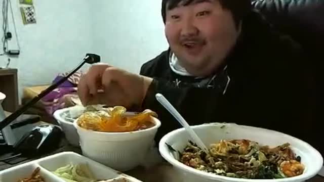 Funny asian man (too happy to eat food)