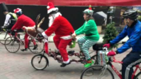 funny santa cycling