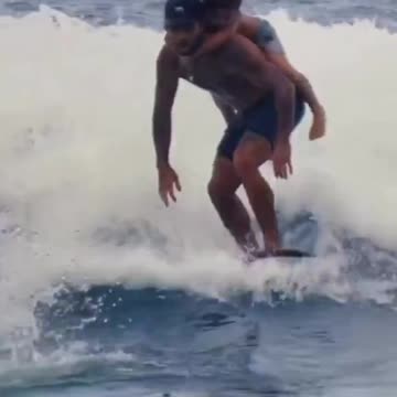 Father and son on the perfect surfing?