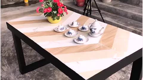 A simple yet stunning coffee table made with cement and tiles