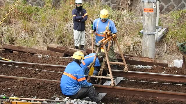 Workers replacing the ties