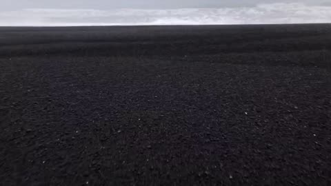 What a beautiful natural scene the sea and snow blend perfectly