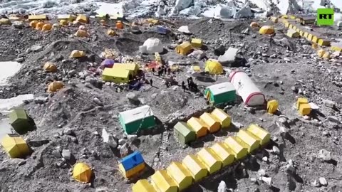 Everest's highest camp appears covered with frozen garbage