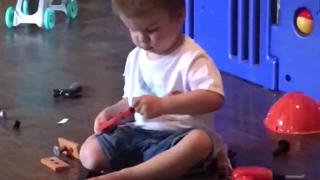 2 year old Learning about tools