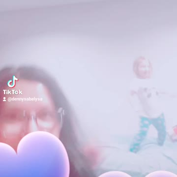 Mom reacts to daughter's dancing skills.