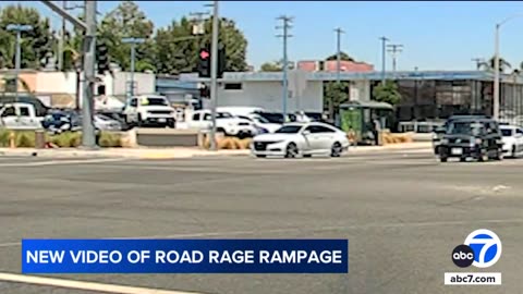 ROAD RAGE New video shows man running through traffic in road rage confrontation