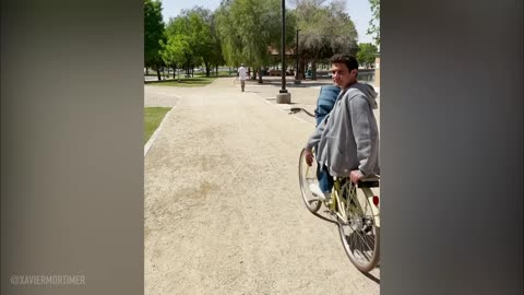 MAN CUT IN HALF ON A BIKE