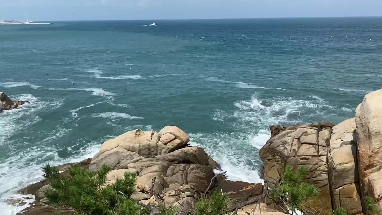 The waves that break on the rocks.