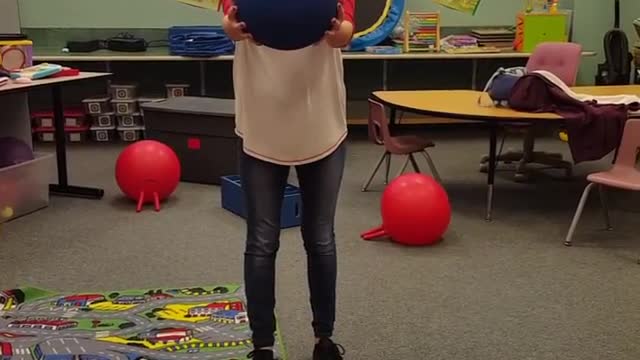 Classroom bottle on ball hit camera