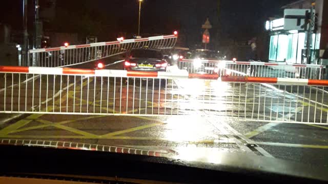 Impatient Driver Forces Car Under Train Barriers