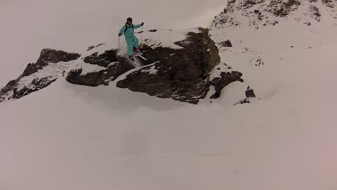 Blue skier jump piste scorpion