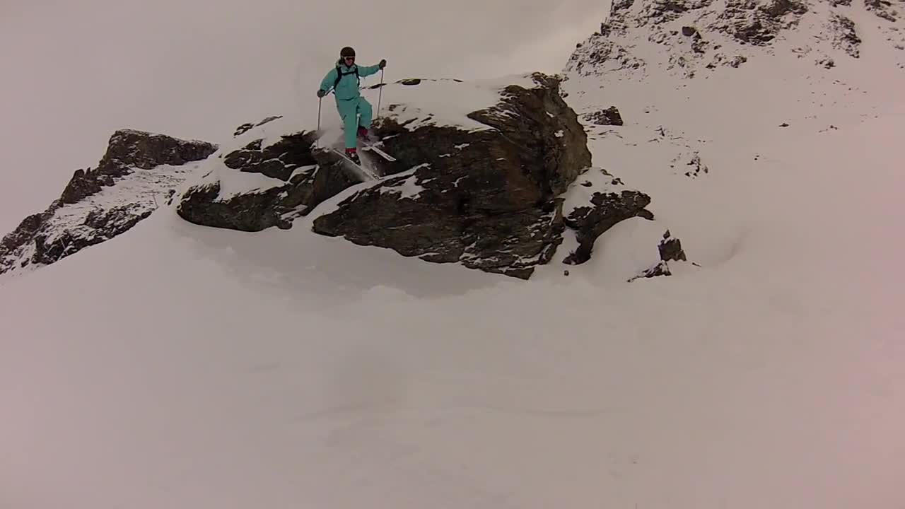 Blue skier jump piste scorpion