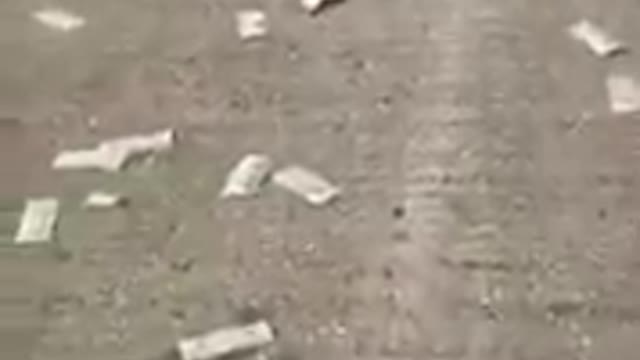 Video shows people picking up money on the side of WB I-70
