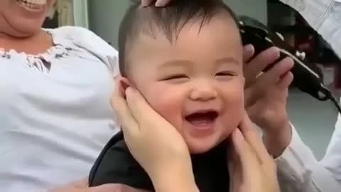 Cute baby's reaction to haircut