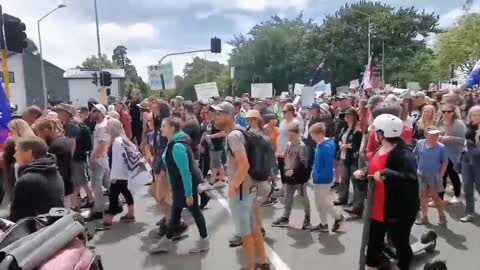 Christchurch New Zealand - Huge crowds march the streets chatting Freedom