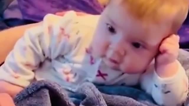 Toddler starring at his dad