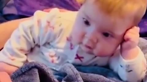 Toddler starring at his dad