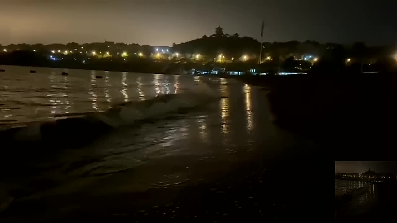 By the sea at night