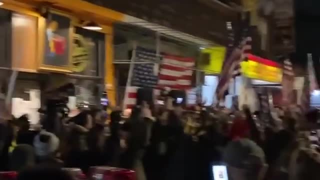 Hundreds of New Yorkers rally when bar owner is arrested.