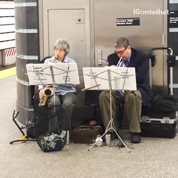Old couple trumpet saxophone duo subway