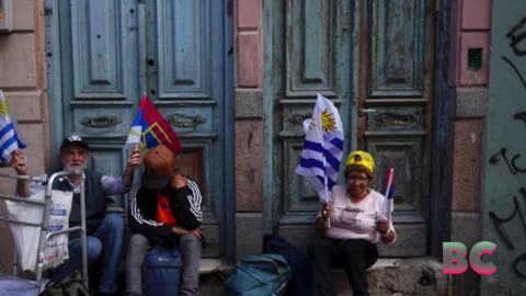 Uruguay’s voters choose their next president in a close runoff