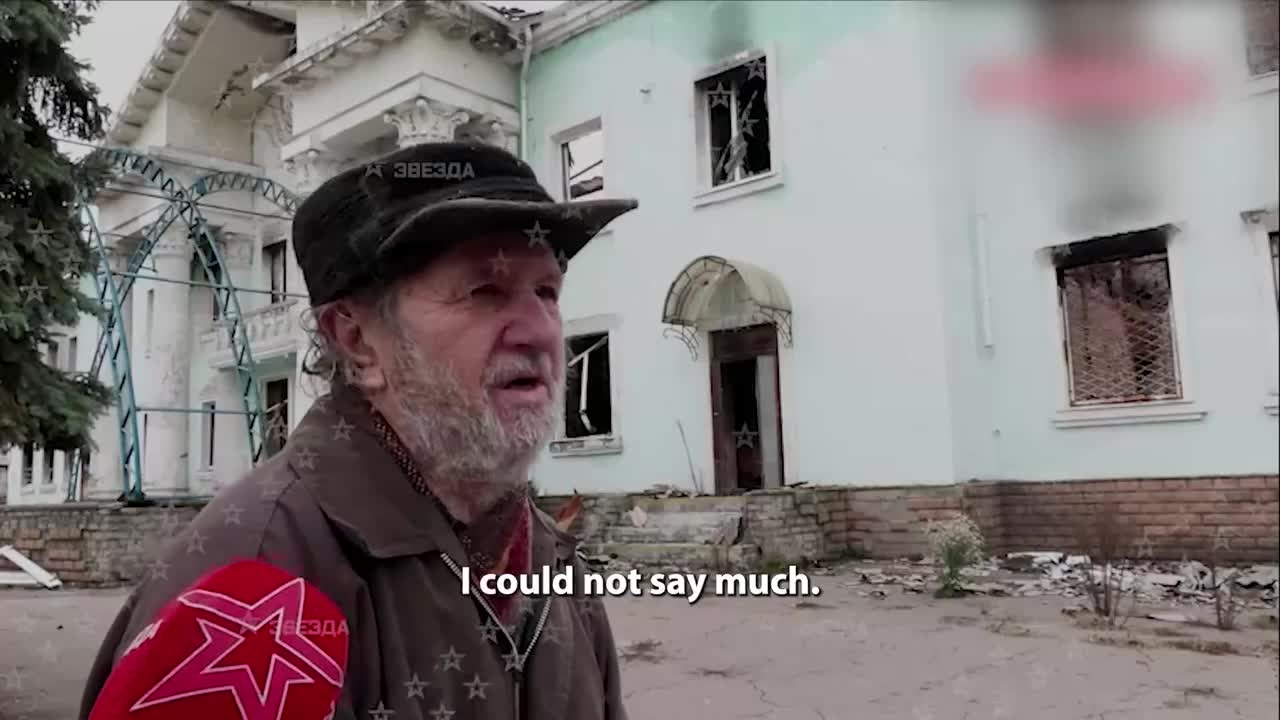 Ukrainians stood by with machine guns