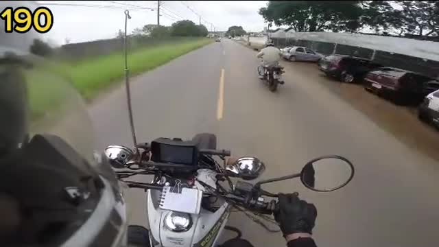 Police chase motorcycle at speed