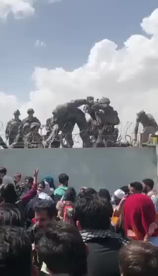 DESPERATE Afghan Crowd Hands Toddler to U.S. Soldiers