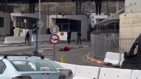 The aftermath of a killing at the Shuafat refugee camp checkpoint in Jerusalem