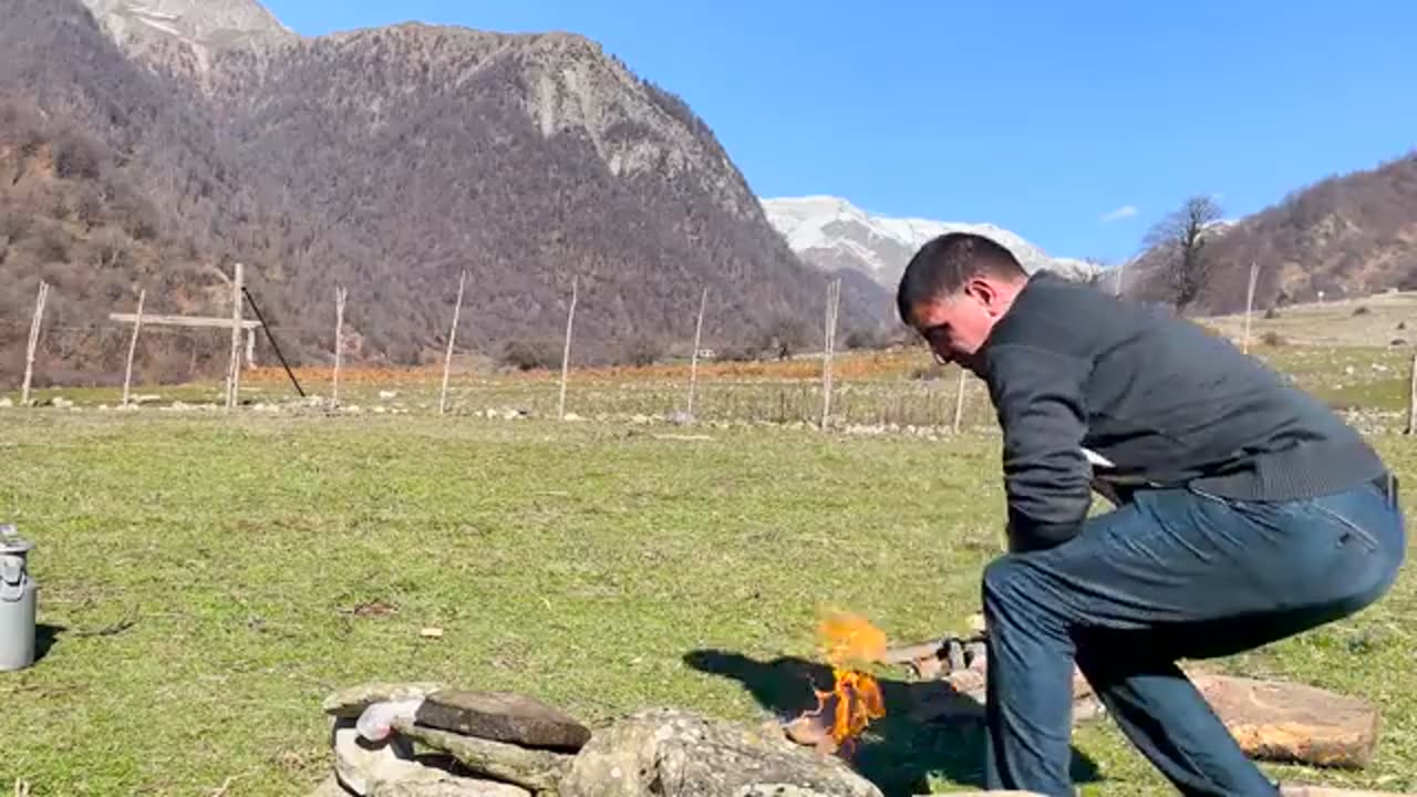 Cooking CARP on a Campfire in the Mountains