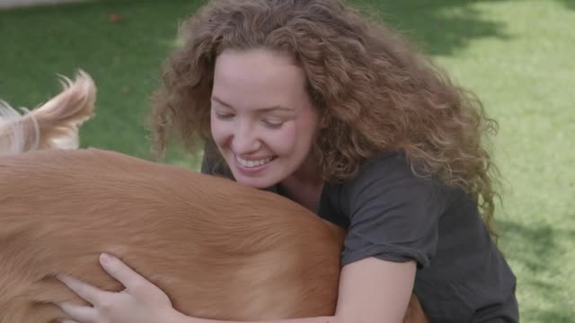 Woman Bonding with Pet Dog