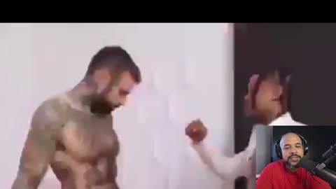 Adam22 fist bumps the dude while doing his wife