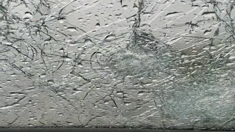 Hail Destroys Driver's Windshield