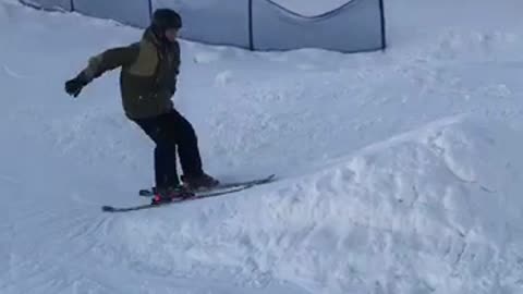 Guy tries doing front flip and falls on snow