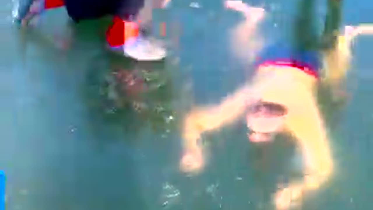Man becomes trapped under ice lake during...