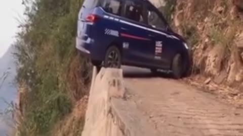 Driving expert U-turn in a very narrow road