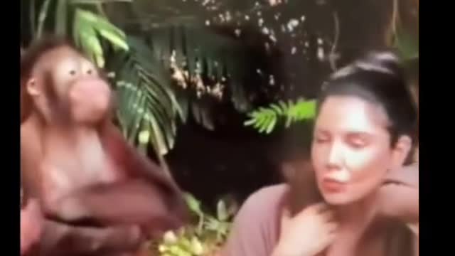 OMG! Monkey harassing a girl in front of the camera