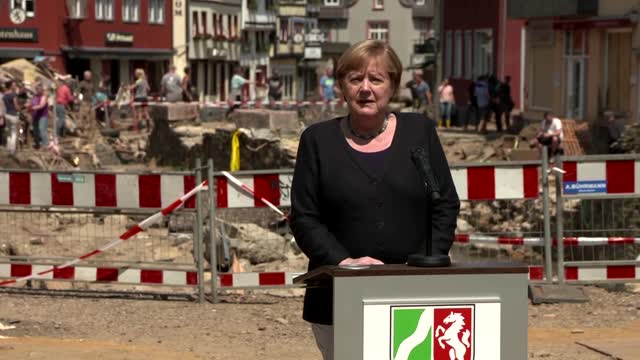 At German flood site, Merkel pledges financial aid