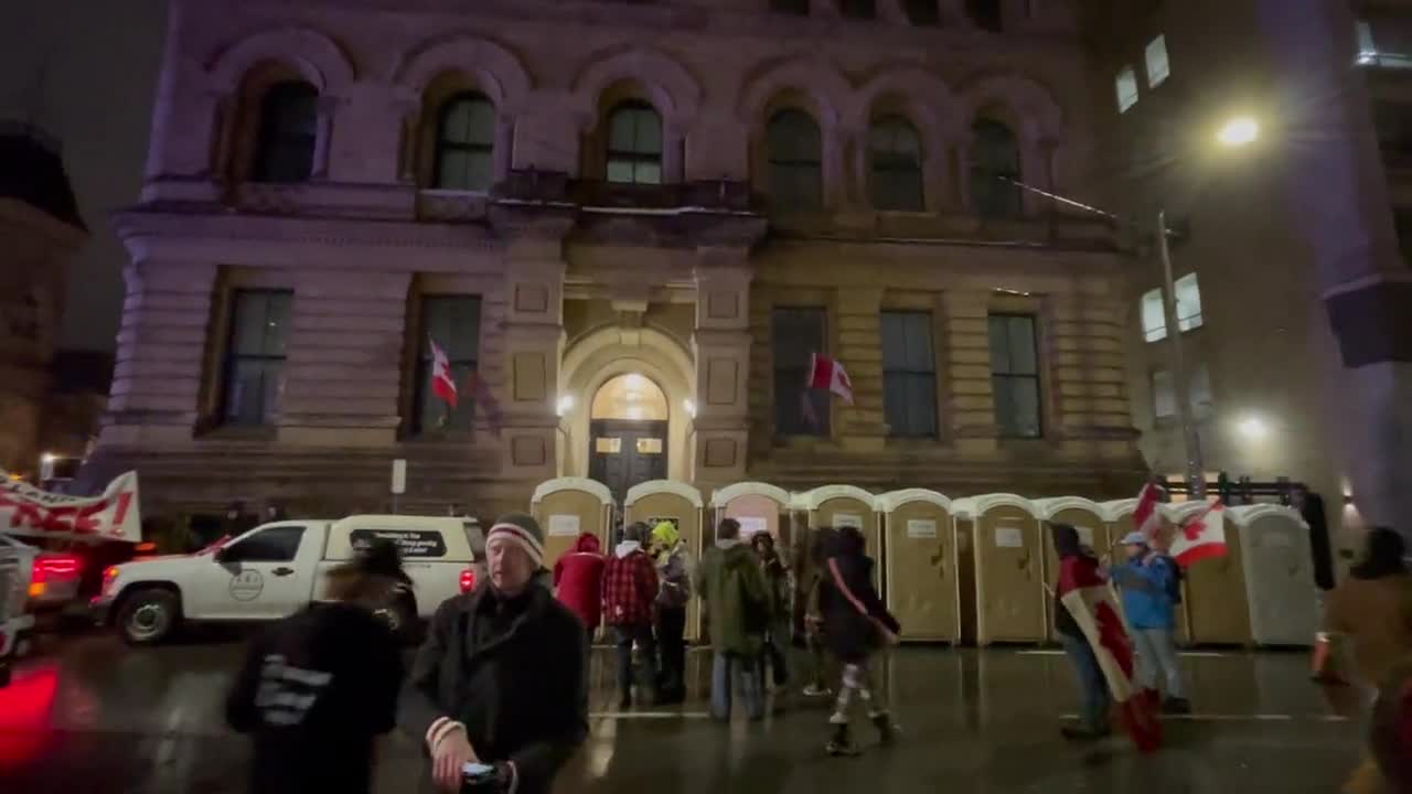 Port-O-Potties line the street in front of Turdeau's office