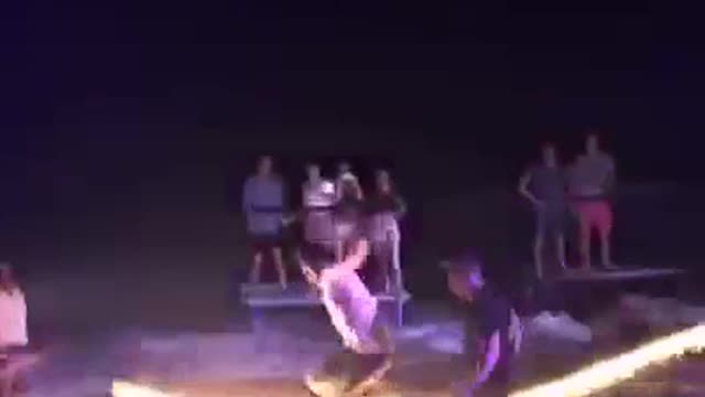 Music fire jumprope fail on beach at night