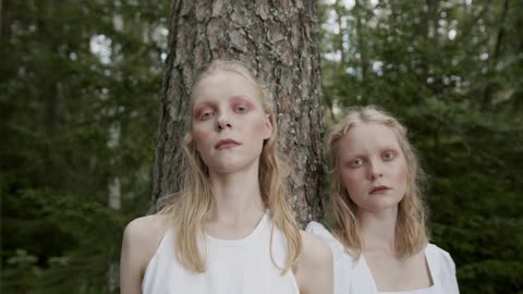 Women Standing Near the Tree