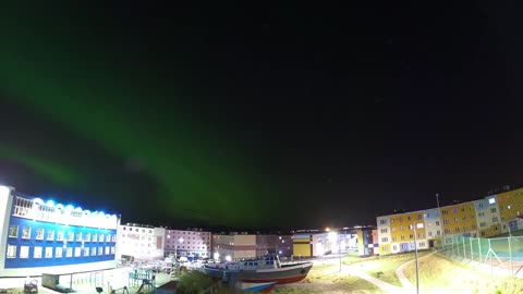 Northern lights over the polar city