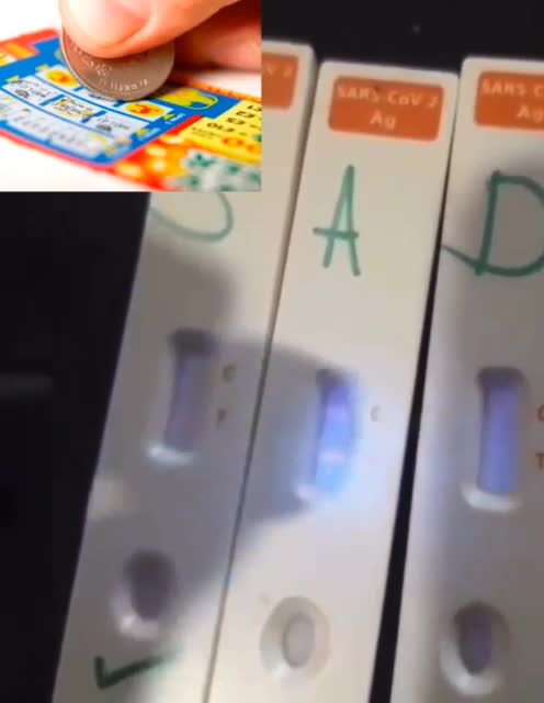 Antigen tests under ultraviolet light show the result already marked in advance,