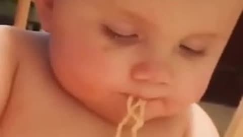 Funny baby eating