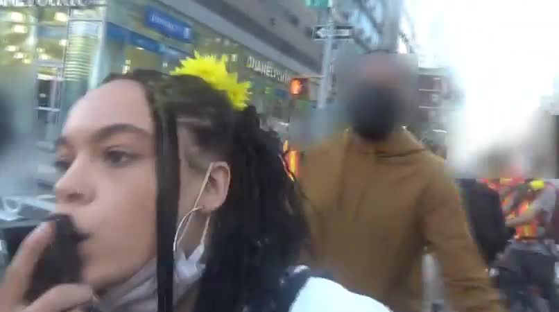 Protester in New York knocks camera out of police officer's hands