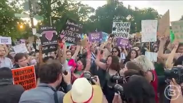 Protestors chanting “f**k* Brett” in front of the Supreme Court