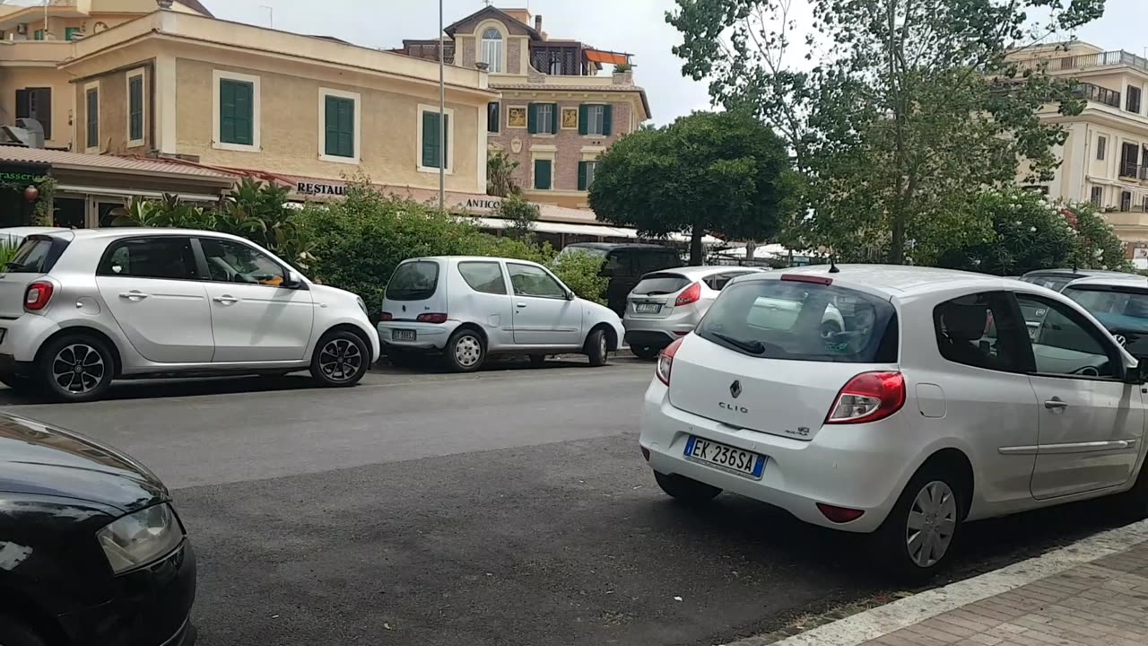 big rubbish bin on the street of Ostia