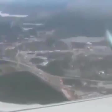 UFO?? Old clip of a SMOKE RING UFO seen from a flight