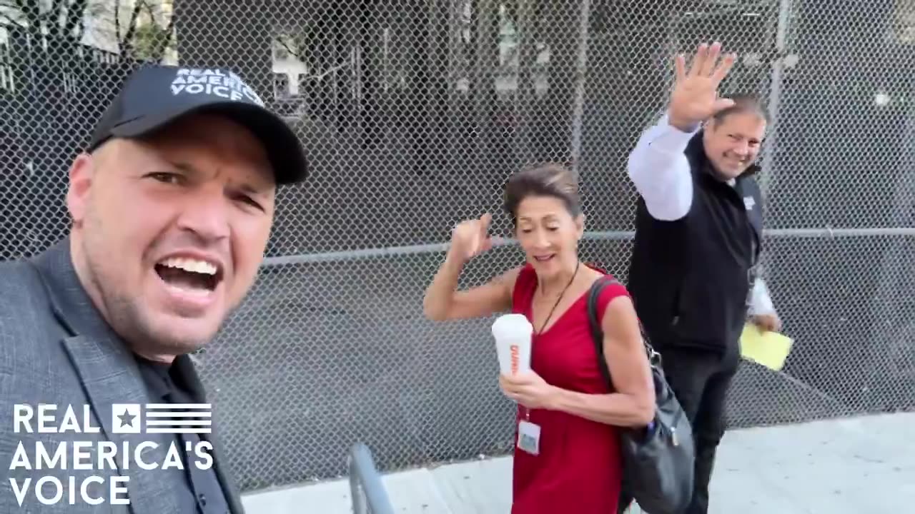 Ben Bergquam ask Joy Reid questions outside of the court house.